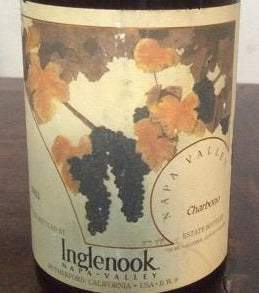 Wine bottle with label on a wooden surface